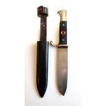 A German Third Reich Hitler Youth Knife, one side of the steel blade etched Blut und Ehre!, the