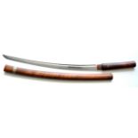 A Japanese Shinshinto Wakizashi, the 60.5cm steel blade with a narrow fuller running along the