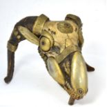 A Nepalese/Tibetan Shaman Ram's Skull, with applied brass decoration to the horns, eyes, muzzle