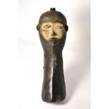 A Pende Mbuya Type Forehead Mask, with topknot, domed forehead, the face with white pigmentation,