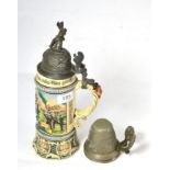 An Imperial German Cream Pottery Beerstein, moulded with infantryman around a campfire and