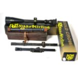 Five Rifle Scopes:- a Nikko Stirling Gold Crown 4-12x50, boxed as new; a Nikko Stirling 6-24x42AO,