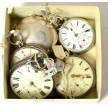 A group of four silver cased pocket watches and one white metal pocket watch, including one with