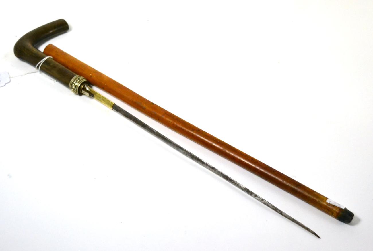 A sword stick of small proportions, possibly a swagger stick or child's cane