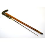 A sword stick of small proportions, possibly a swagger stick or child's cane