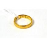 A 22ct gold band ring