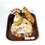 Three Royal Crown Derby paperweights including, Lion (silver stopper), Leopardess (silver stopper)