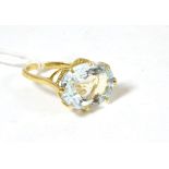 A 9ct gold ring set with an aquamarine