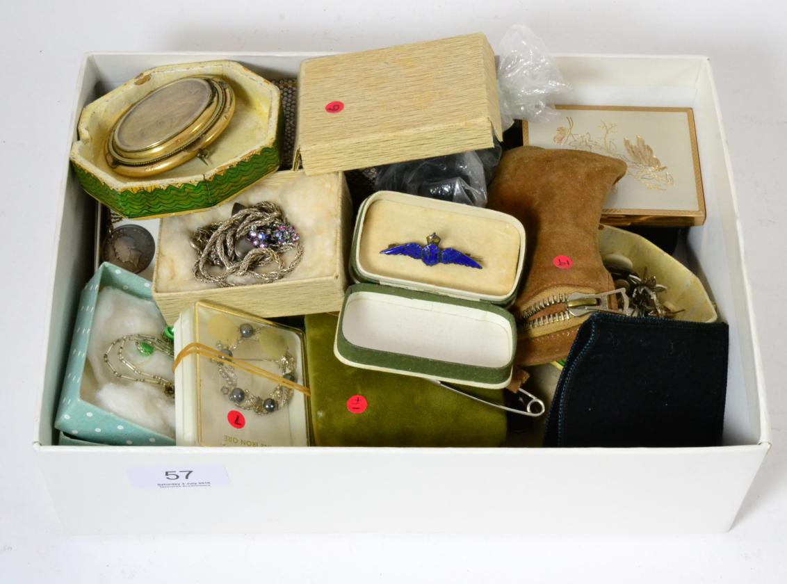 A group of jewellery including a Victorian yellow metal mourning brooch, an enamel RFC bar brooch,