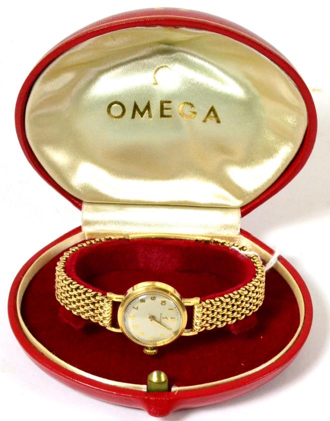 A lady's Omega 9ct wristwatch, associated bracelet, cased