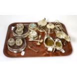 A group of silver including a six division toast rack, two decanter labels, matching cream and