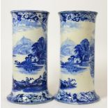 A pair of Prattware blue and white vases depicting lakeland scenes, 22cm high Crazed throughout.