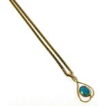 A 9ct gold chain with opal set pendant, stamped 9ct