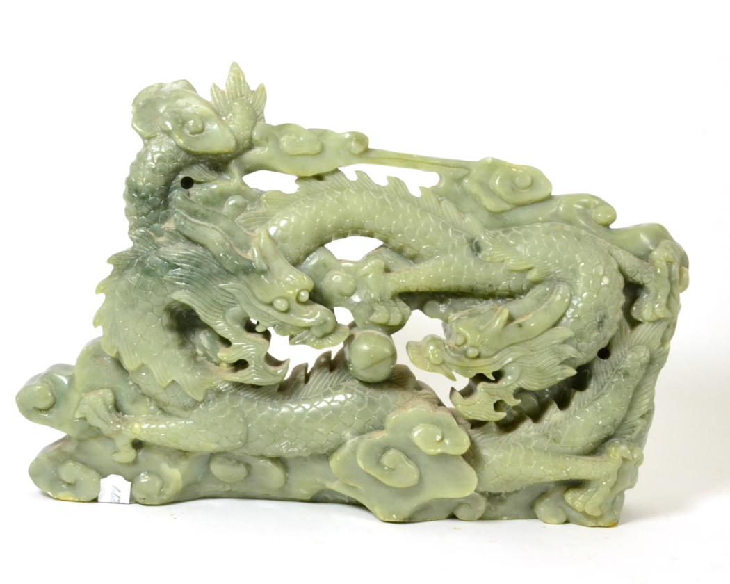 A Chinese jade type dragon plaque No visible cracks, some slight scratching to surface and one or