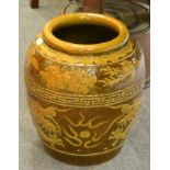 A brown glazed vase decorated with dragons