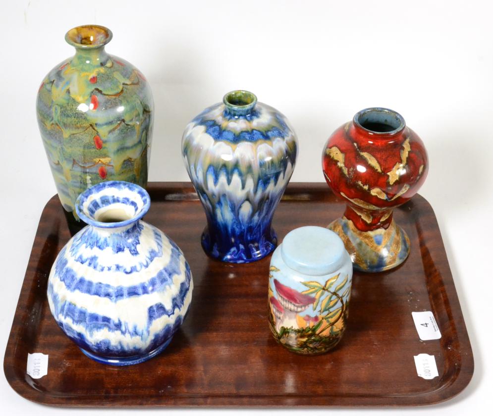 Three Cobridge pottery vases (two boxed), a Cobridge pottery jar and cover and a Black Ryden pottery