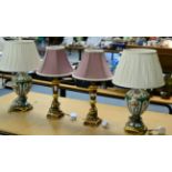 A pair of Sevres style painted porcelain table lamps with silk shades and a pair of composition
