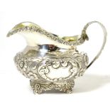 A silver cream jug, London 1824