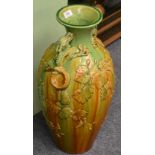 An Oriental glazed vase, 64cm high Large repaired chip to rim, crazed throughout.