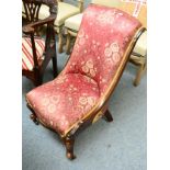 A Victorian mahogany framed nursing chair