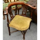 A Georgian mahogany corner chair, with shaped arms, twin pierced splats and X-stretcher