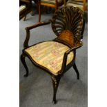 A late Victorian inlaid mahogany open armchair with anthemion back