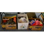 Three boxes of miscellaneous including board games, linen etc