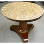 A mid 19th century French marble topped mahogany circular pedestal table raised on a substantial