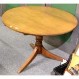 A 19th century oak circular top tripod table, assorted pictures and watercolours, ceramic framed