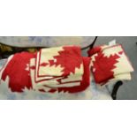 A Pottery Barn quilted red and white cotton bedspread with four matching pillow cases