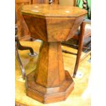 A mahogany sewing table