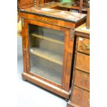 An inlaid mahogany pier cabinet