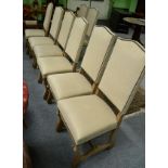 A set of eight modern high backed dining chairs