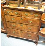 An early 18th century walnut chest of drawers