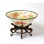 A Ding Type Bowl, carved and later enamelled with precious objects, the exterior with sprigs and a