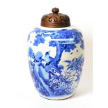 A Chinese Porcelain Ovoid Jar, 19th century, painted in underglaze blue with a bird perched on