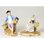 A Pair of Meissen Porcelain Figures of a Farmer and His Wife, late 19th century, each sitting