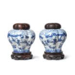 A Pair of Chinese Porcelain Hexafoil Baluster Jars, painted in underglaze blue with figures in a