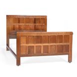 A Robert ''Mouseman'' Thompson Panelled Oak 4'6'' Bedstead, with penny moulded top, carved mouse