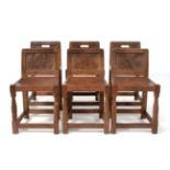 A Set of Six 1930s/40s Robert ''Mouseman'' Thompson Burr Oak Solid Back Chairs, with aperture