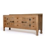 A 1930s/40s Robert ''Mouseman'' Thompson Oak 5'11'' Sideboard, with raised upstand, above a