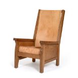 A Robert ''Mouseman'' Thompson Oak Smoking Chair, with slung leather back, solid seat with cow
