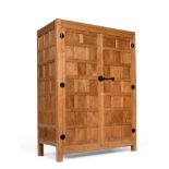 A Robert ''Mouseman'' Thompson Panelled Oak Wardrobe, with half penny moulding above two doors,