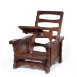 A Robert ''Mouseman'' Thompson Oak Reading Chair, circa 1929, with adjustable ladder back and