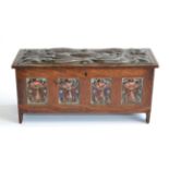 An Arts & Crafts Oak and Copper Casket, in the form of a blanket chest, the rectangular copper