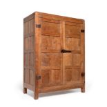 A 1930s Robert ''Mouseman'' Thompson Panelled Oak Wardrobe, with penny moulded top, above two