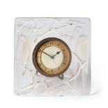 A René Lalique Inseparables Clear and Opalescent Glass Dressing Table Clock, moulded with two