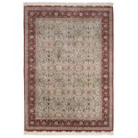 Fine Hereke Design Silk Rug The ivory field with an allover design of plamettes and scrolling