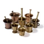 A Collection of Eight 17th, 18th and 19th Century Bronze Mortars and Pestles, including an unusual