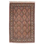 Good Ghom Rug of Rare Design Central Persia The ivory field of trailing vines and boteh enclosed